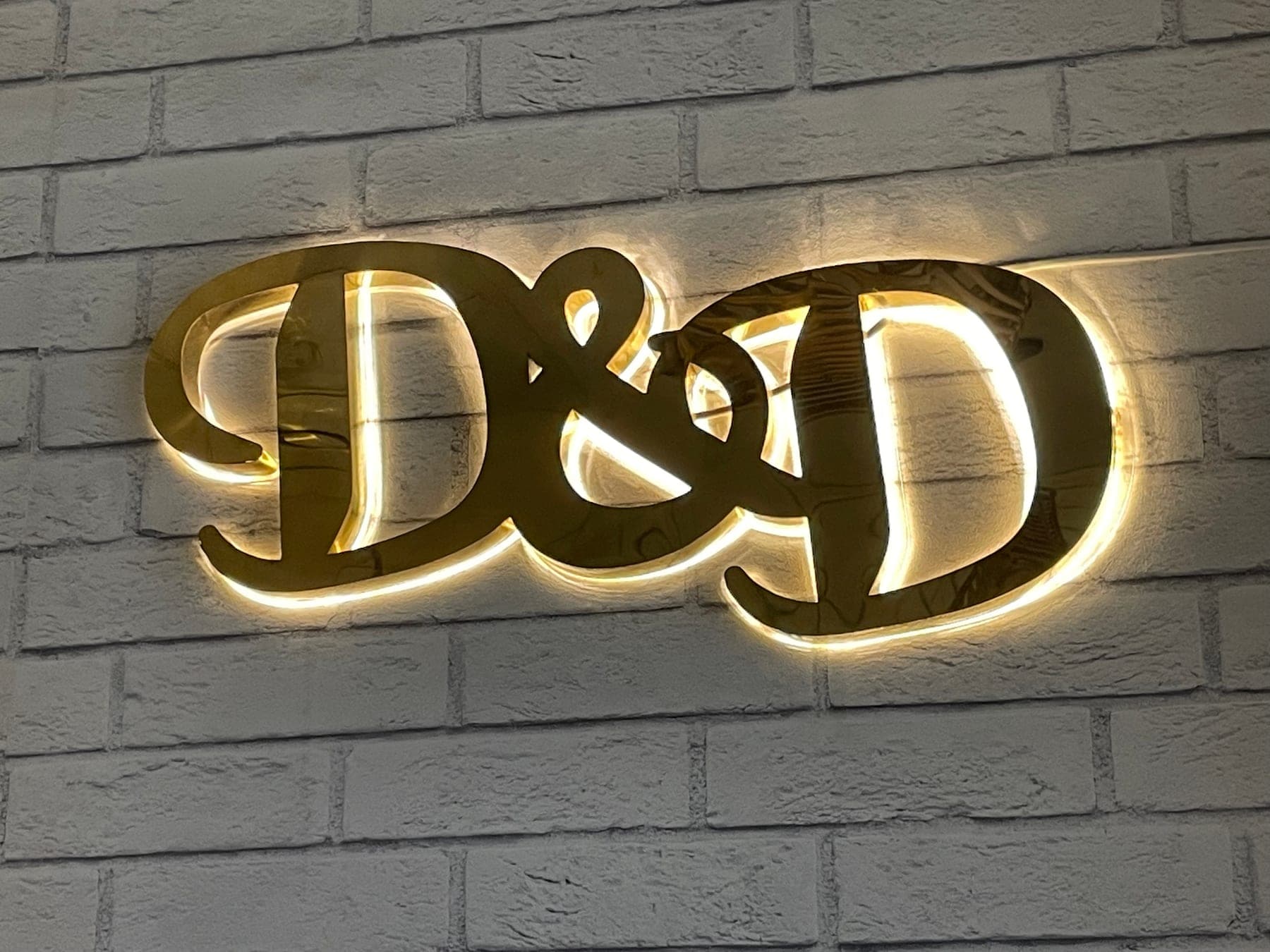 Dames & Dudes Logo Signage
